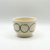 Contrasting round ceramic cup