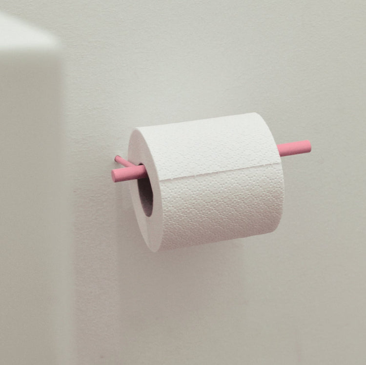 Pink toilet paper holder 