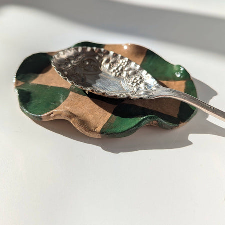 Repose-cuillère à carreaux verts