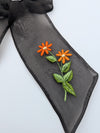 Ruban noir brodé fleur