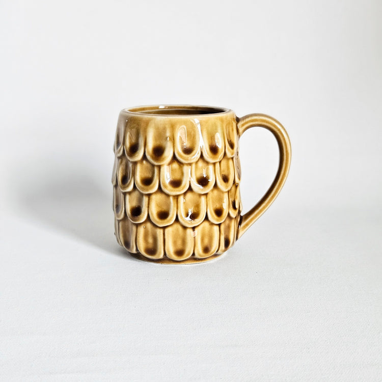 Tasse vintage en céramique texturée