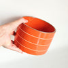 Cache-pot vintage en céramique rayée