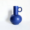 Vase en céramique matte bleu vintage