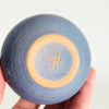 Soliflore seconde main en céramique bleu mat