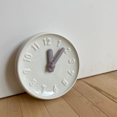 Horloge murale en céramique [tel quel]